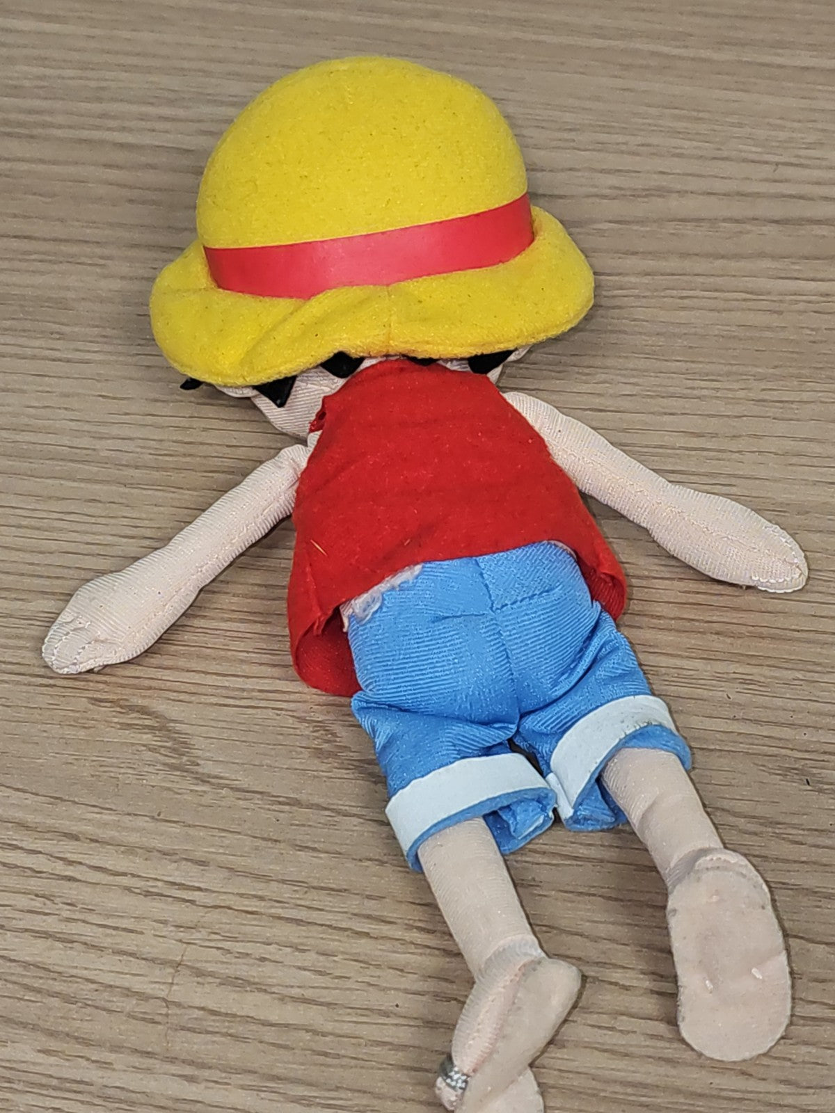Peluche One Piece Luffy d?occasion ? Collection rare ? Bon état, objet collector