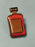 Vintage pin's bouteille alcool Disaronno rouge émaillé collection (Ref 3)