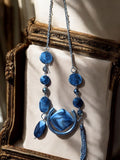 Collier vintage fantaisie bleu créateur, perles aspect marbré métal, pendentif u