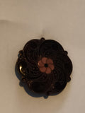 Broche vintage fleur émaillée noire et rose, motif stylisé rétro