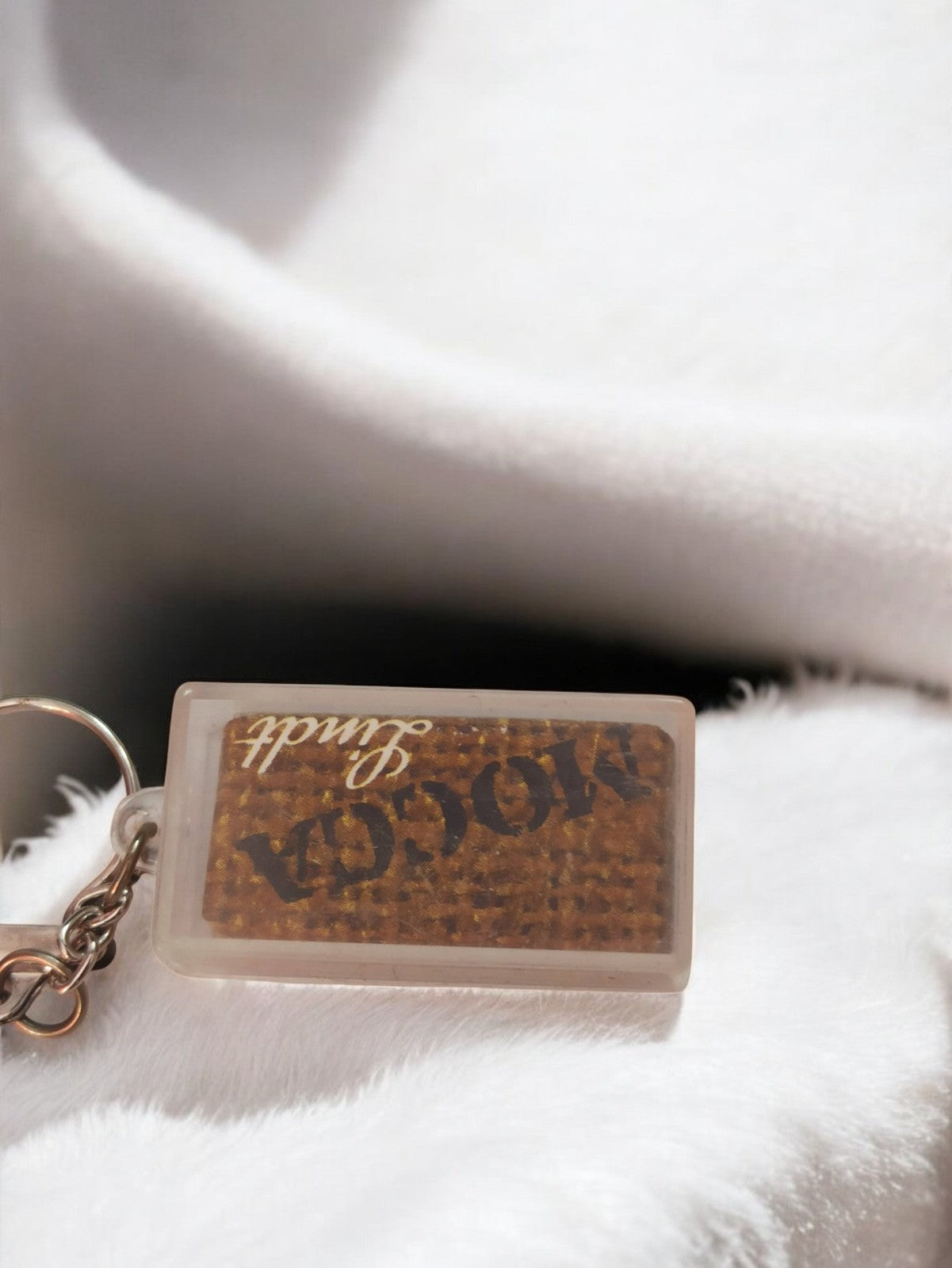 Porte-clés ancien Lindt vintage publicitaire chocolat rétro rectangulaire