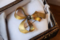 Broche nœud vintage dorée strass, bijou fantaisie Made in France rétro