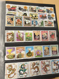 Lot de timbres thématiques République du Bénin autos fleurs dragons couleurs viv