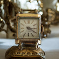Montre mécanique vintage 17 rubis carrée à restaurer, cadran doré, ancien