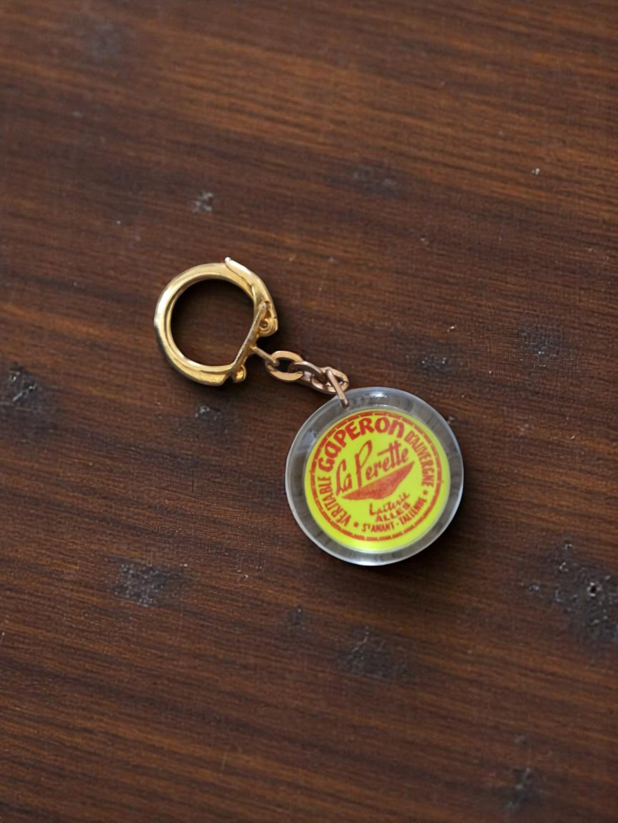 Porte-clés vintage Gaperon La Perette métal publicitaire rétro années 60