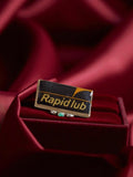 Pin's publicitaire vintage métal émaillé Rapidlub noir jaune rectangulaire