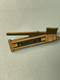 Vintage pin's publicitaire Fluocaril tube émaillé vert jaune collection rare