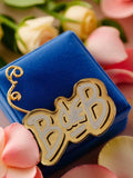 Pin's BdB édition limitée vintage doré lettrage blanc rétro pub