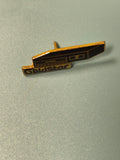 Pin's vintage GoldStar noir et doré, forme rétro, collection, occasion