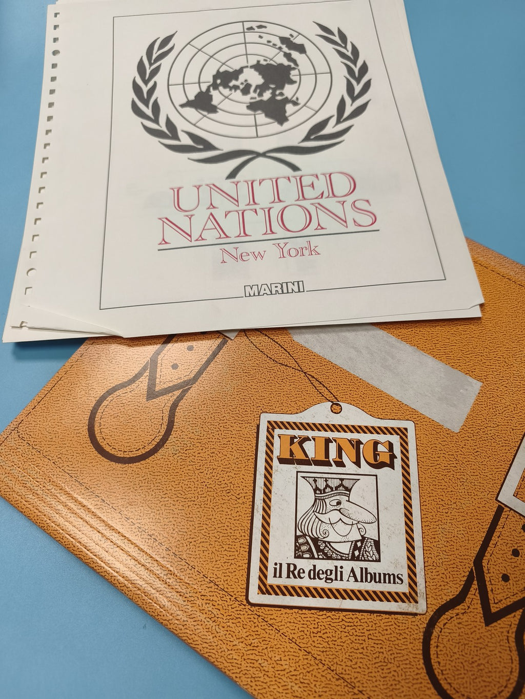Classeur timbres USA avec feuillets Nations Unies Marini, couverture orange