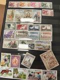 Lot timbres Laos Postes divers formats et couleurs, motifs animaux, paysages, po