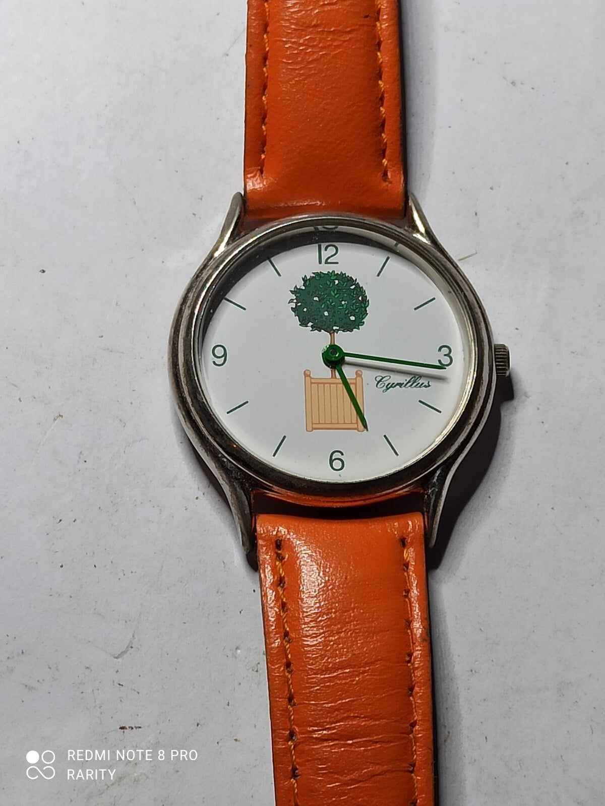 Montre femme Cyrillus vintage cadran décor arbre bracelet orange pile