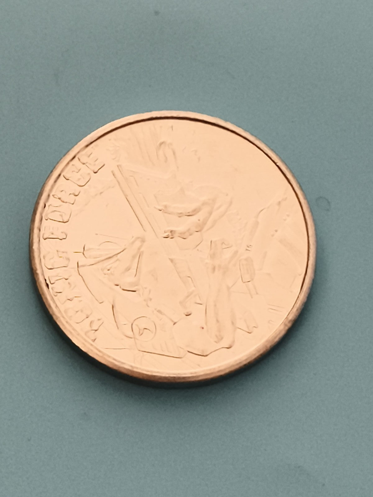Médaille ronde aspect doré motif Force France pièce souvenir