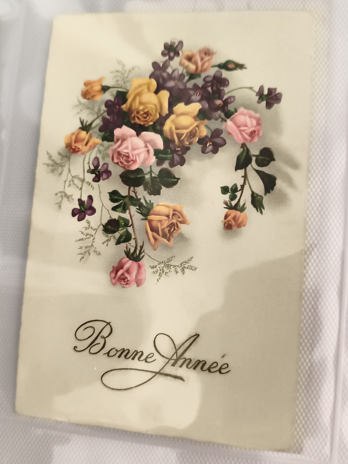 Carte postale ancienne Bonne Année fleurs relief CPA début XXe vintage