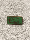 Ancien pin's Rayonner vert émaillé vintage badge rectangulaire années 80