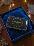 Pin's publicitaire vintage Theben édition limitée doré étoilé