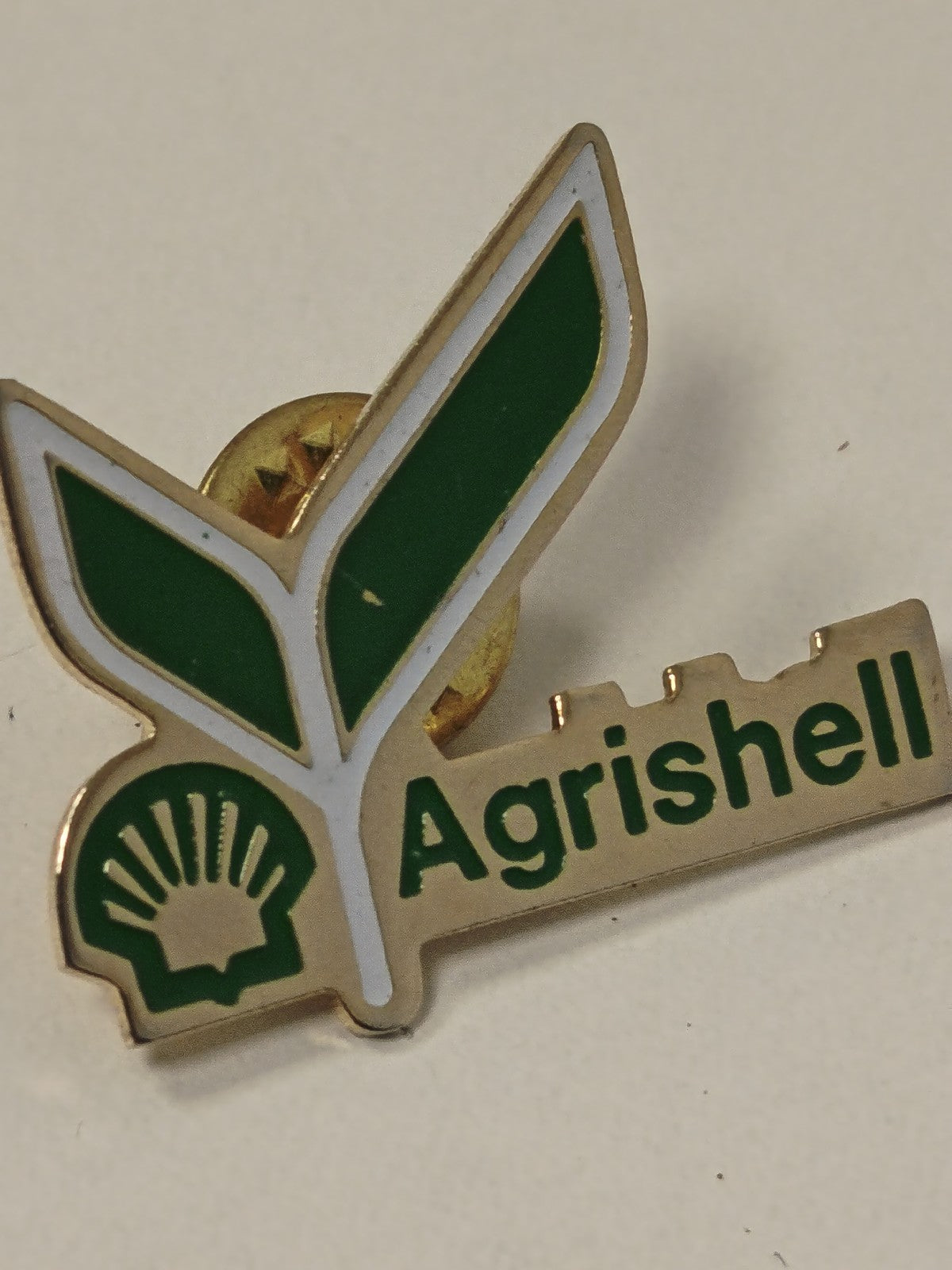 Pin's rétro ancien Agrishell, badge collection vintage, objet publicitaire rare