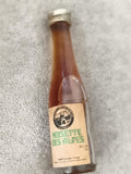 Mini-bouteille liqueur Noisette des Alpes Chambéry digestif partiellement rempli