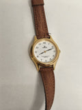Montre vintage Lorus quartz doré cadran blanc, bracelet marron, non testée