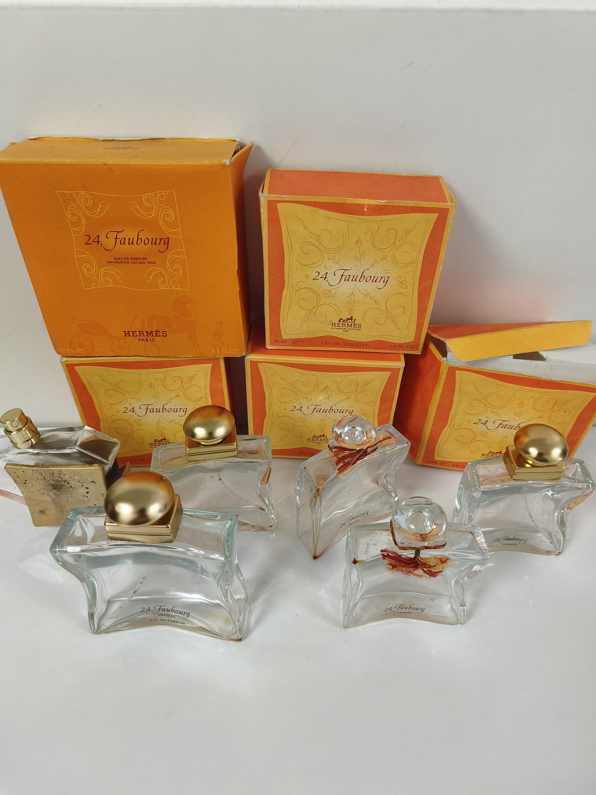 Gros lot flacons vides Hermès 24 Faubourg avec boîtes orange et doré