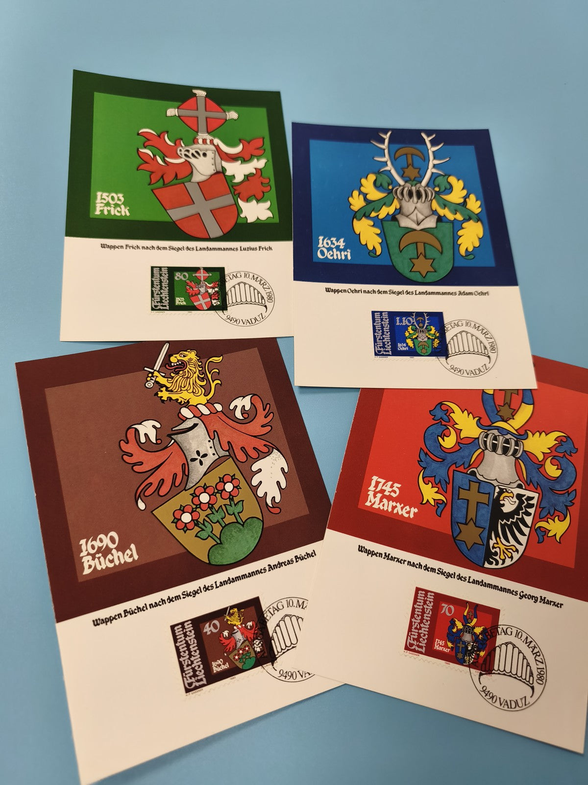 Lot cartes postales blasons Liechtenstein avec timbres et cachets couleurs vives
