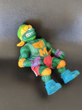 Figurine rétro 1991 Mike sur skateboard Tortues Ninja TMNT ancien collector rare