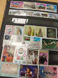 Lot timbres thématiques divers, motifs animaux, trains, sports, arts, multicolor