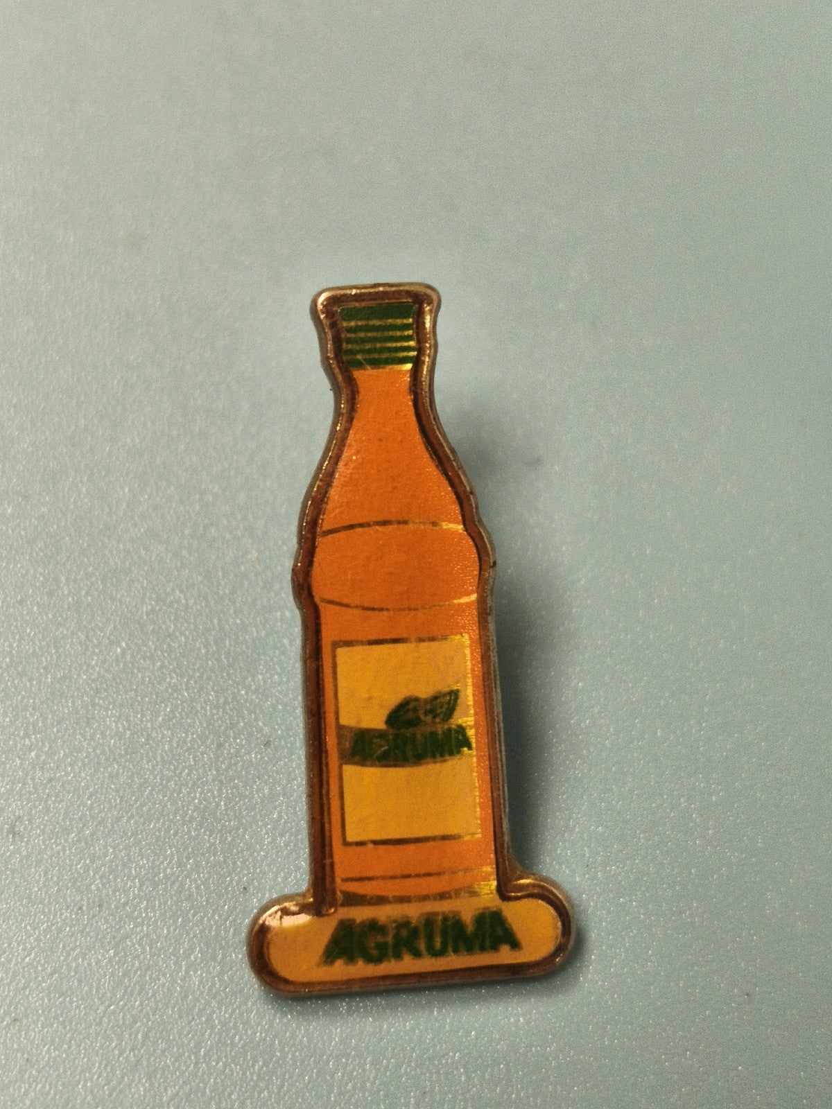 Vintage pin's bouteille Agruma orange publicitaire collection boisson rare