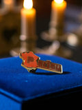 Pin's publicitaire vintage Parfeu édition limitée rouge doré