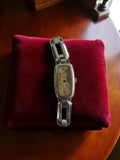 Montre femme vintage Nadexo mécanique, bracelet argenté rétro, non testée