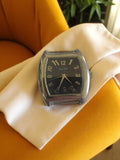 Montre vintage femme Nocibé cadran noir, boîtier argenté, non testée