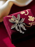 Broche fleur vintage en argent, motif perle, bijou rétro élégant