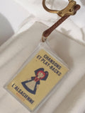 Porte-clés publicitaire ancien L'Alsacienne rétro biscuits chansons vintage