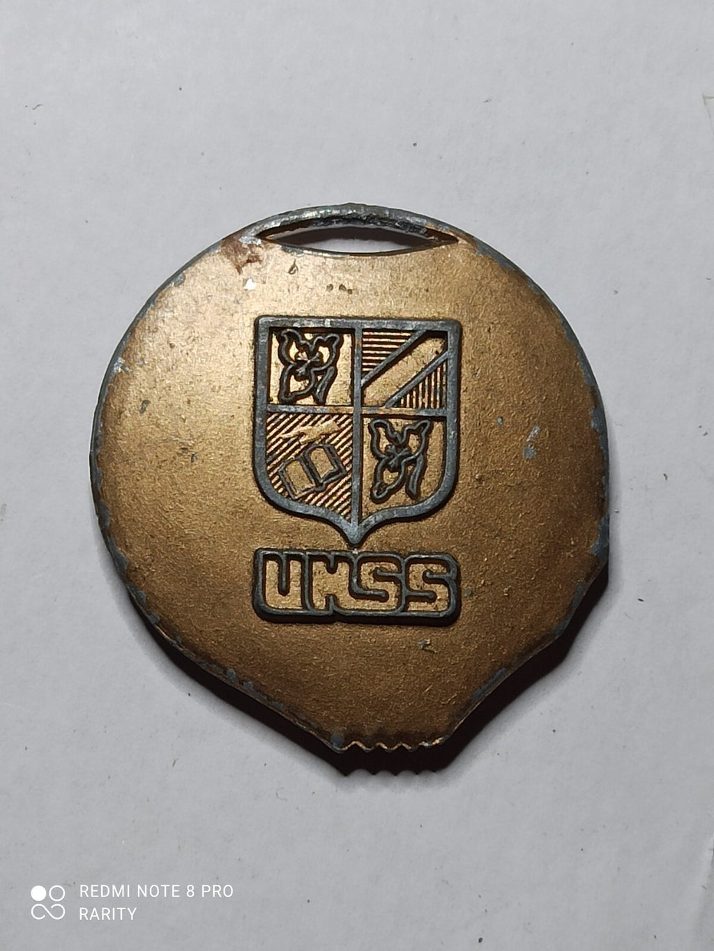Médaille ancienne UNSS blason bronze aspect patiné sport scolaire UKSS
