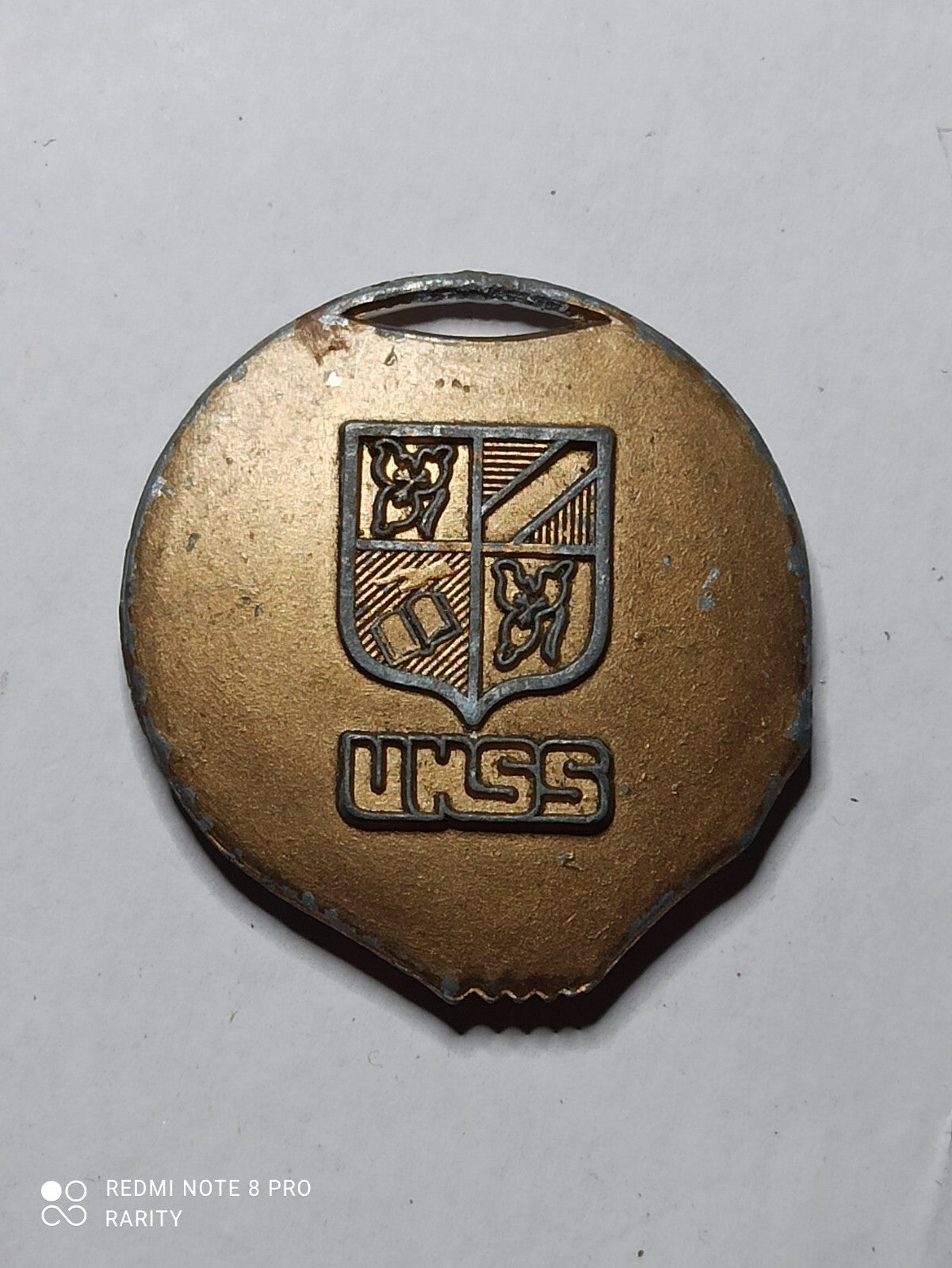 Médaille ancienne UNSS blason bronze aspect patiné sport scolaire UKSS