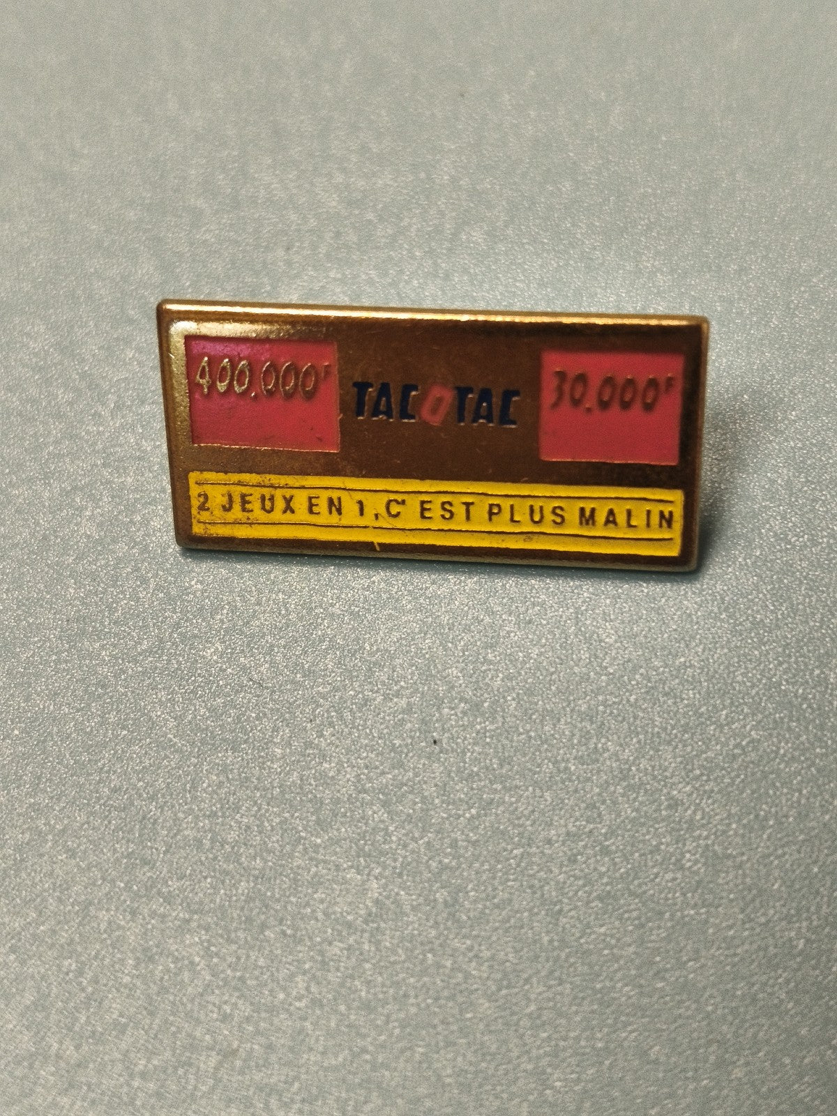 Vintage pin's publicitaire Tacotac rectangulaire, jeu de loterie ancien