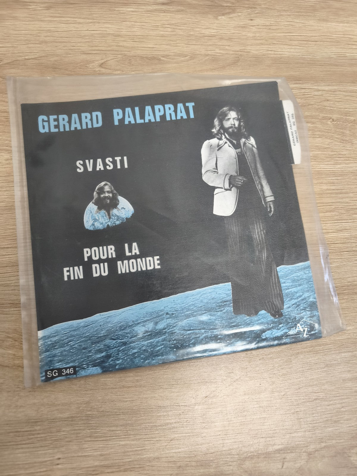 Vinyle 45T Gérard Palaprat Svasti / Pour la fin du monde pochette noire bleue (R