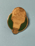 Pin's vintage Philips Lighting USA 1992 Jeux Olympiques, forme ampoule