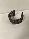 Ancien bracelet manchette en métal ajouré motif tressé vintage rétro