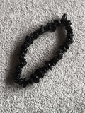 Bracelet chips noir pierres naturelles élastique perles irrégulières