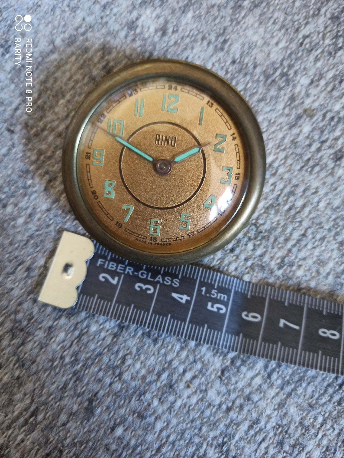 Horloge ancienne RINO vintage, cadran doré, mécanisme à remontoir, Made in Franc