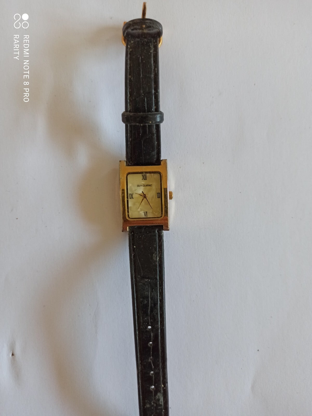 Montre vintage Guy Clarac cadran nacre, rectangulaire, bracelet noir, rétro