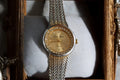 Montre vintage Laura Mérosi femme, cadran doré strass, bracelet maille métal