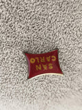 Pin's vintage SAN CARLO rouge émaillé, badge publicitaire ancien (Ref 5)