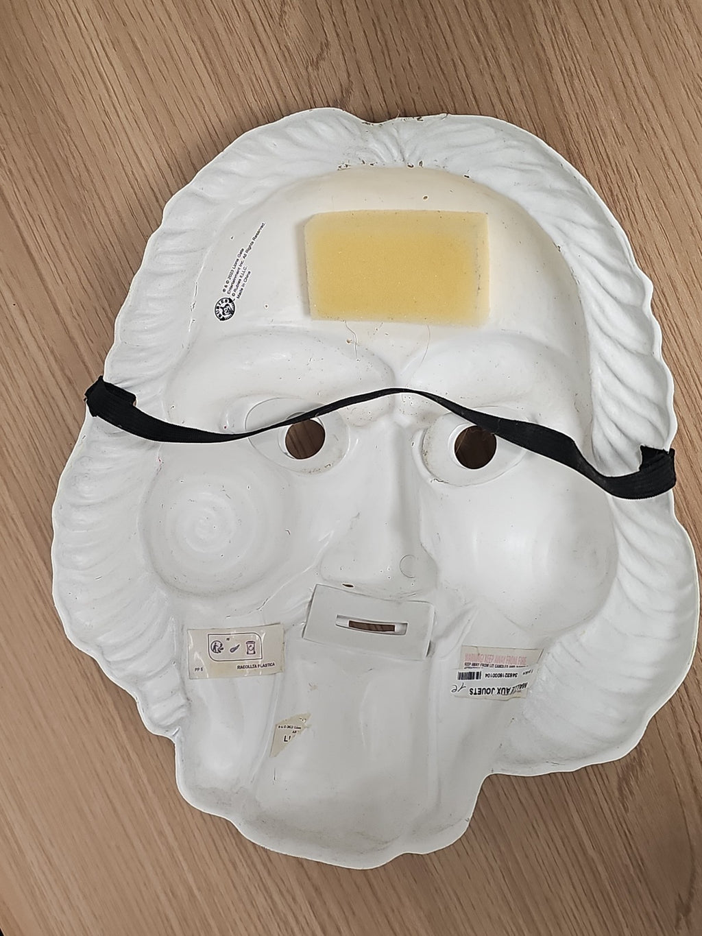 Masque ancien style Saw visage spiralé blanc noir rouge horreur déco vintage