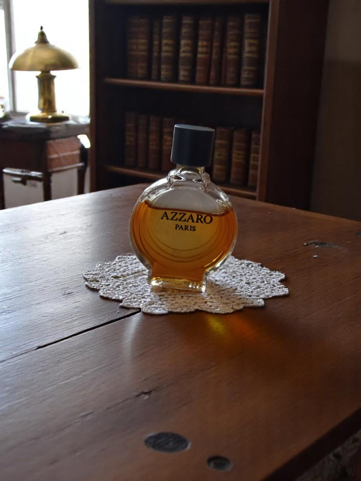 Miniature parfum vintage Azzaro Paris flacon rond rétro déco collection