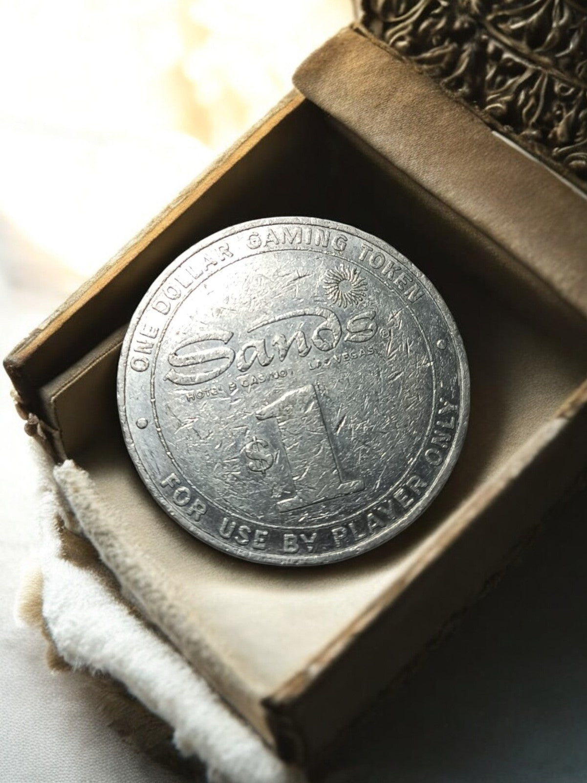 Jeton de casino vintage métal Sands Las Vegas $1 – token USA ancien
