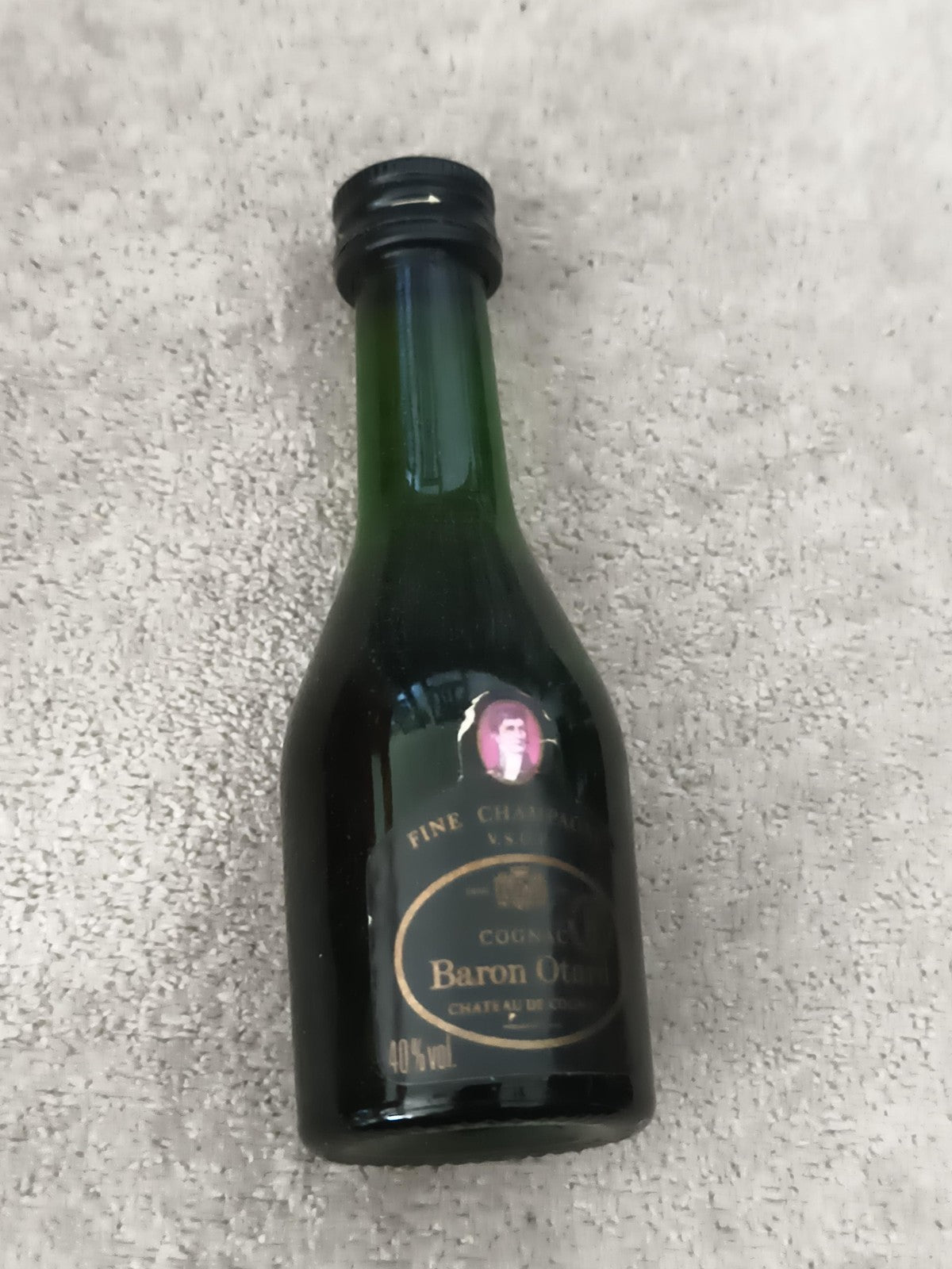 Mini-bouteille cognac Baron Otard Fine Champagne partiellement remplie