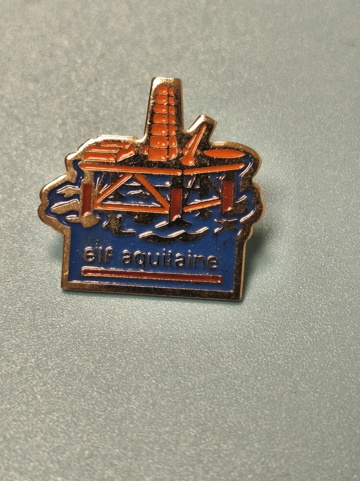 Vintage pin's Elf Aquitaine plateforme pétrolière bleu orange collection (Ref 18