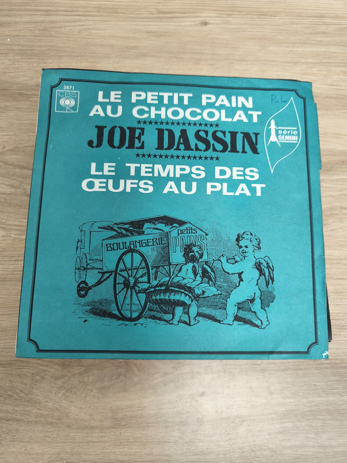 Vinyle 45T Joe Dassin Le Petit Pain au Chocolat / Le Temps des ?ufs au Plat poch